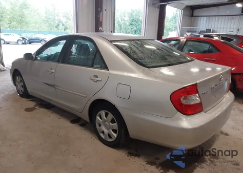 2003 Toyota Camry Le z USA, uszkodzony, nr VIN 4T1BE32K53U675331